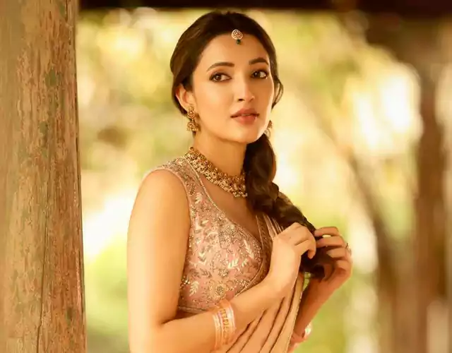 Golden Grace in Every Glance - Neha Shetty